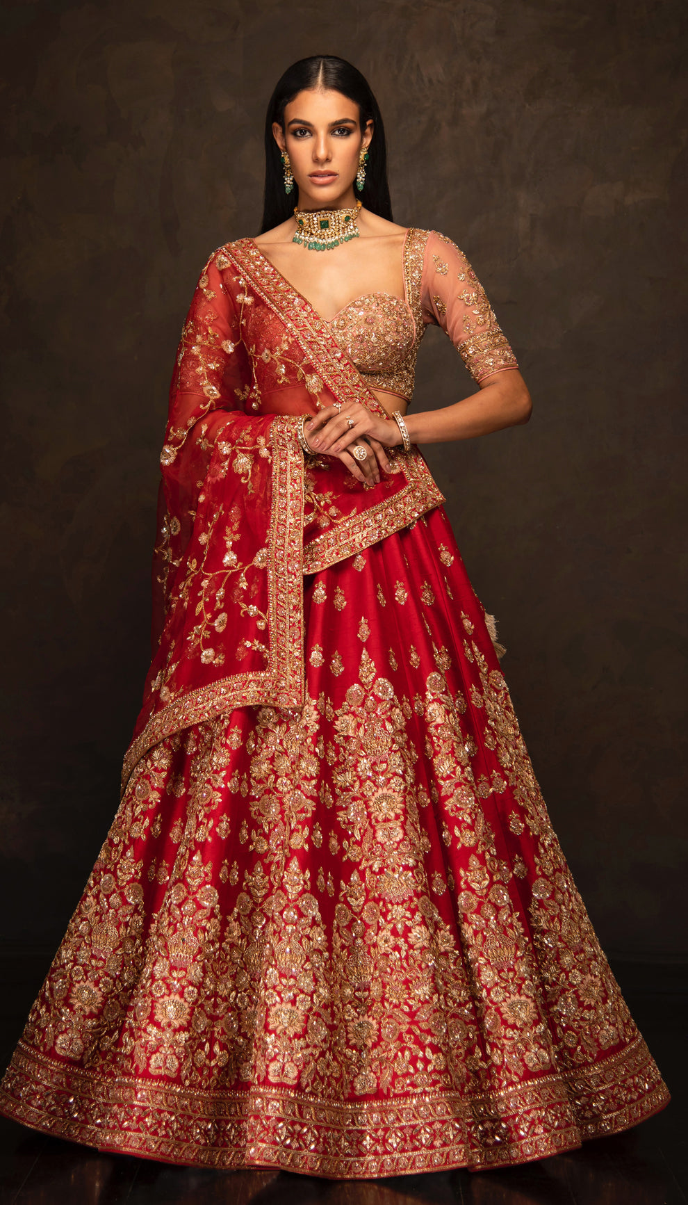 The Red Embroidered Raw Silk Bridal Lehenga