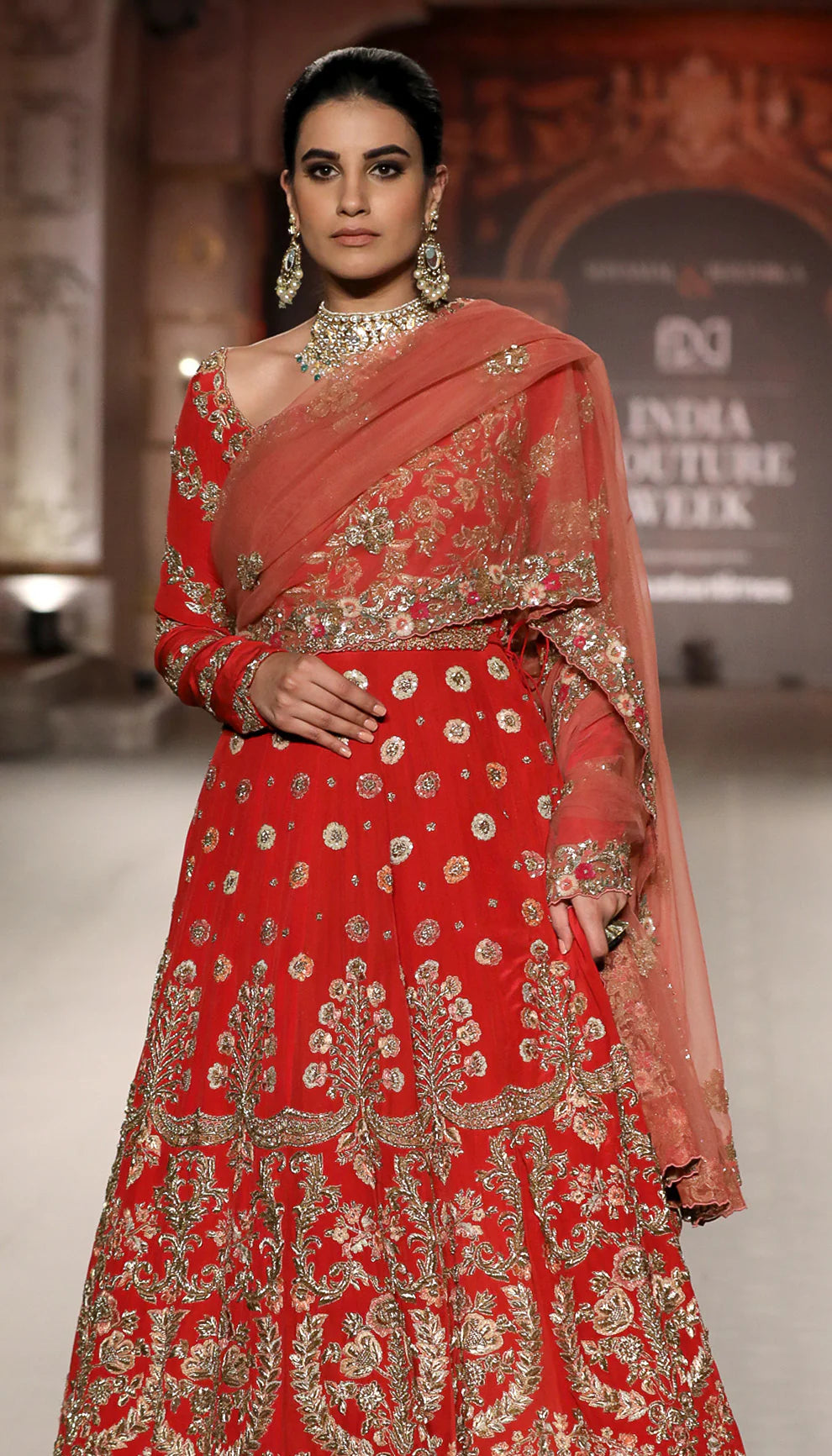 A Fiery Red Crepe Silk Bridal Kalidar Gown