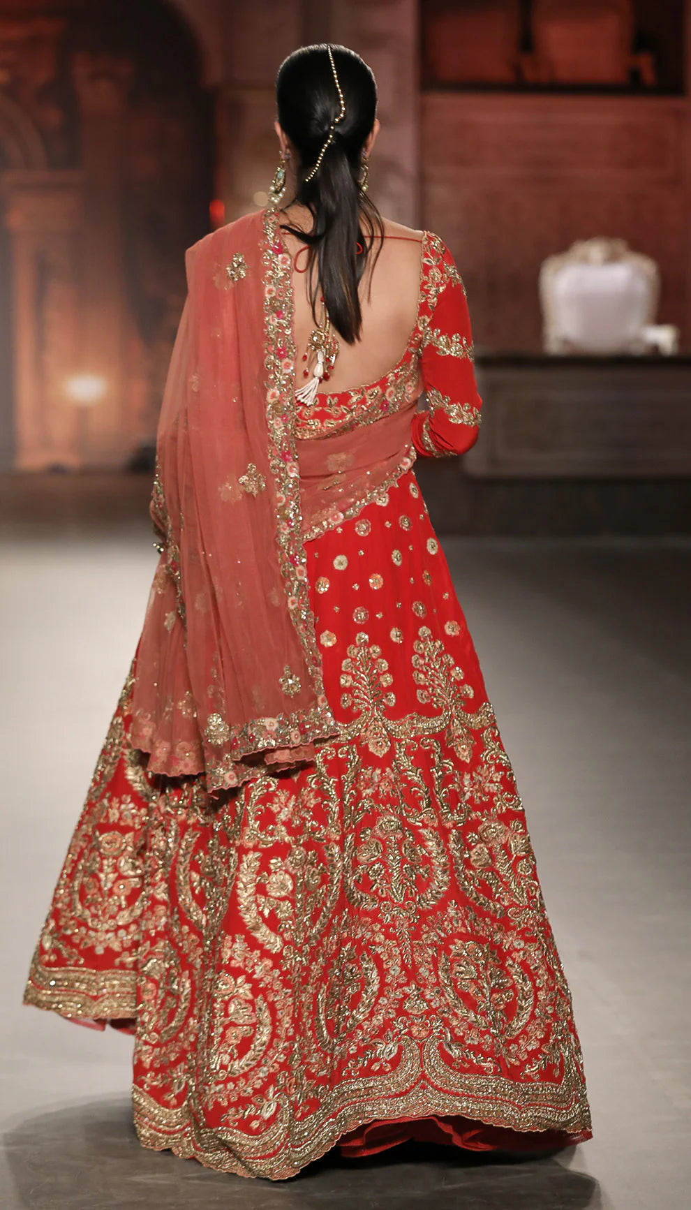 A Fiery Red Crepe Silk Bridal Kalidar Gown