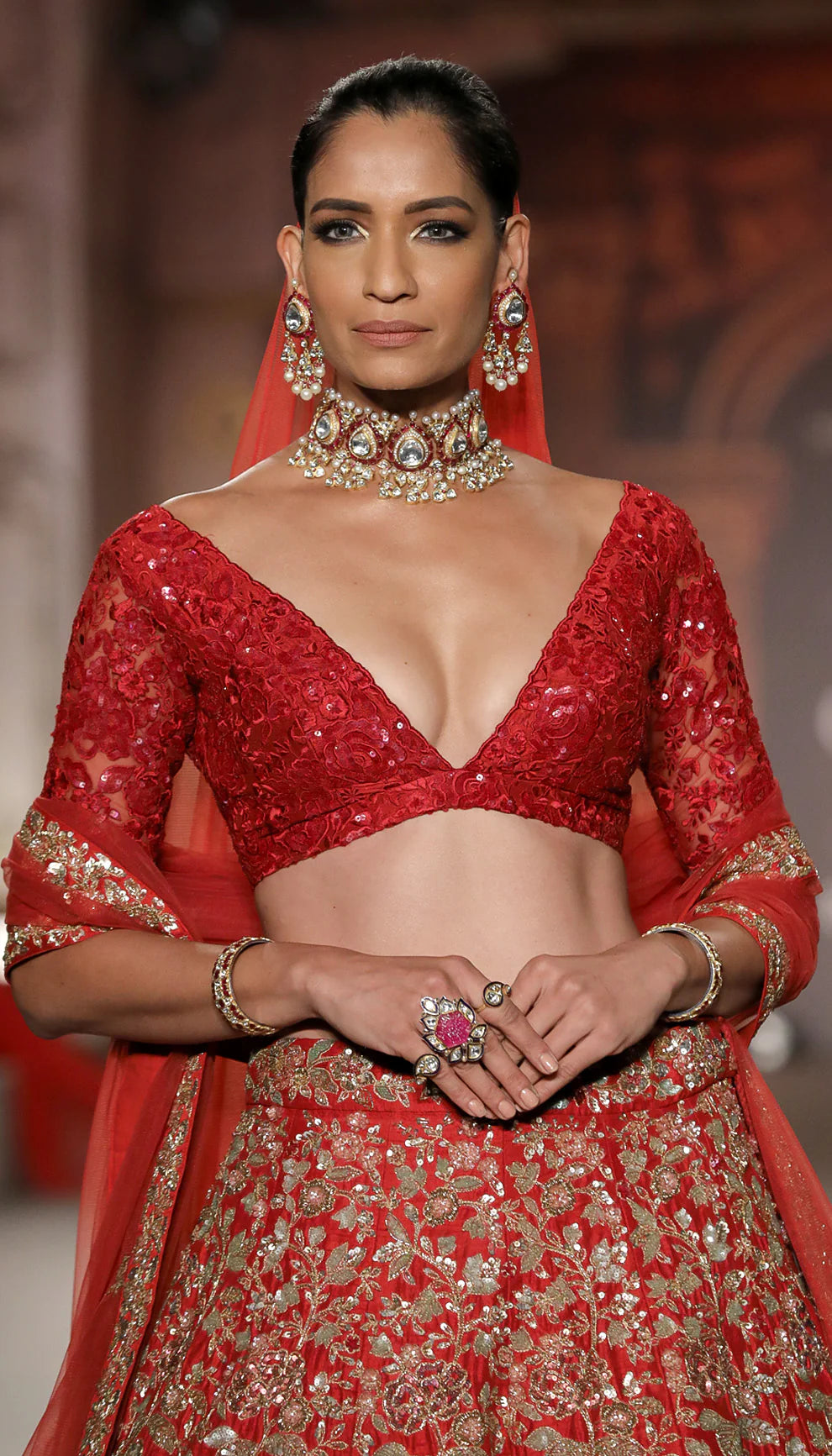 Model in The Deep Red Flower Cluster Lehenga by Shyamal & Bhumika.
