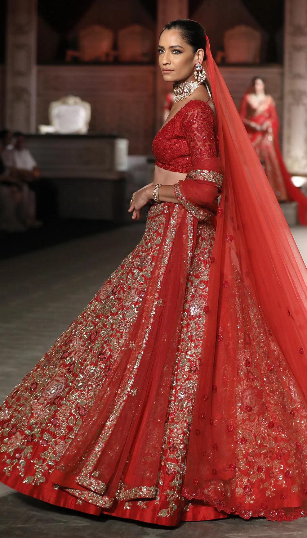 Model in The Deep Red Flower Cluster Lehenga by Shyamal & Bhumika.