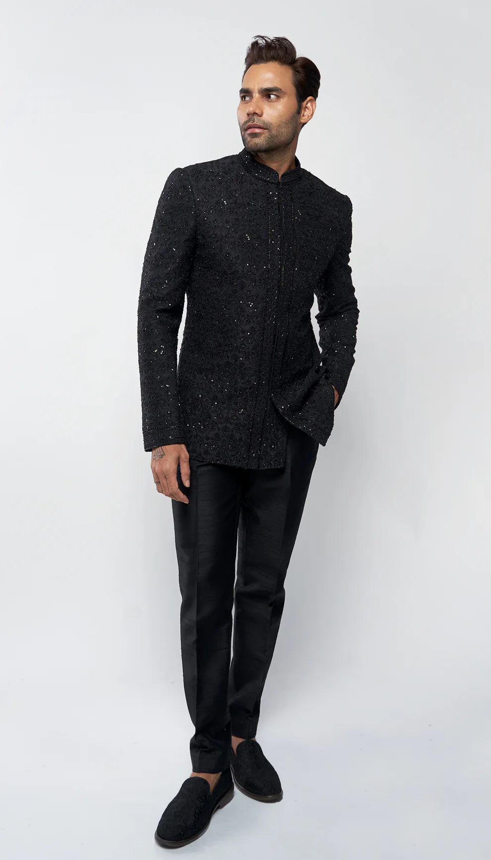 Ebony black, men's bandhgala jacket, tone- on- tone embroidery, seed beads, sequins, raw silk trousers, weddings, formal celebrations, black- tie evenings