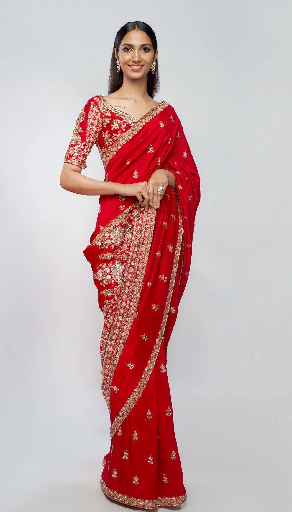 Cherry red, dupion silk saree, floral motifs, zardozi, peeta embroidery, floral border, silk blouse, aari, weddings, festive occasions, evening celebrations