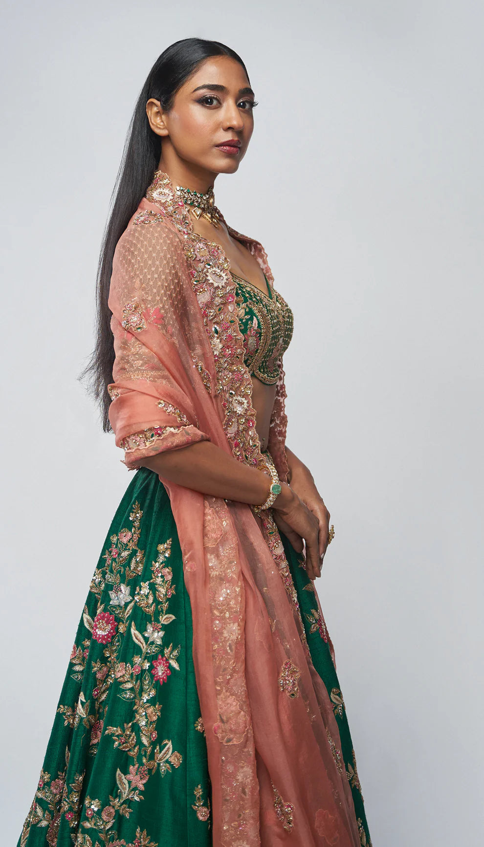 Forest green, raw silk lehenga, embroidered, lotus motifs, kali, zardozi, peeta, applique, embellished blouse, silk organza dupatta, wedding, festive occasions, evening events, green lehenga, designer lehenga, green silk lehenga, designer silk lehenga