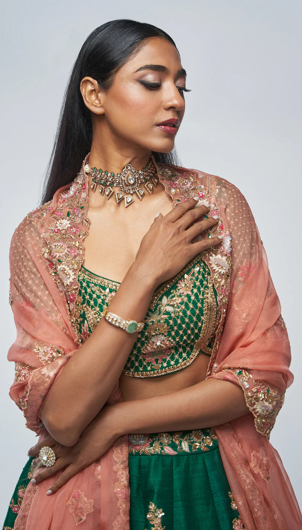 Forest green, raw silk lehenga, embroidered, lotus motifs, kali, zardozi, peeta, applique, embellished blouse, silk organza dupatta, wedding, festive occasions, evening events, green lehenga, designer lehenga, green silk lehenga, designer silk lehenga