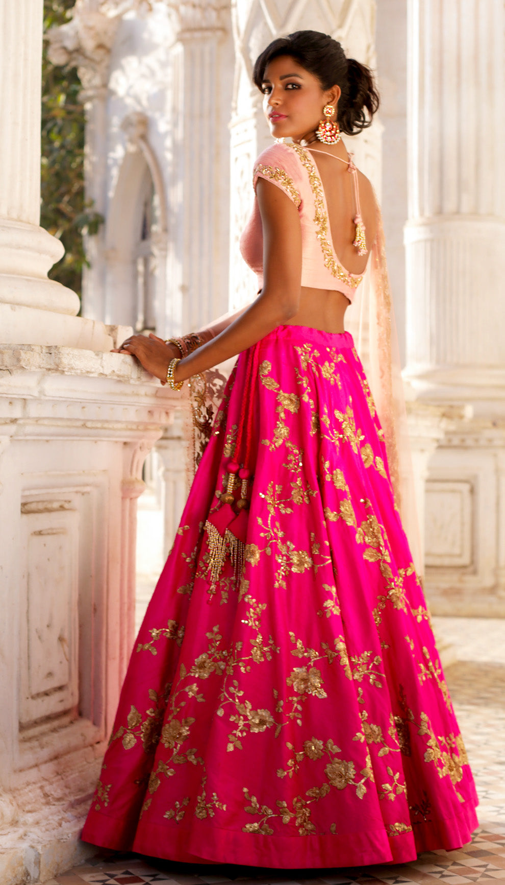 Woman wearing The Rani Pink Floral Lehenga by Shyamal & Bhumika.