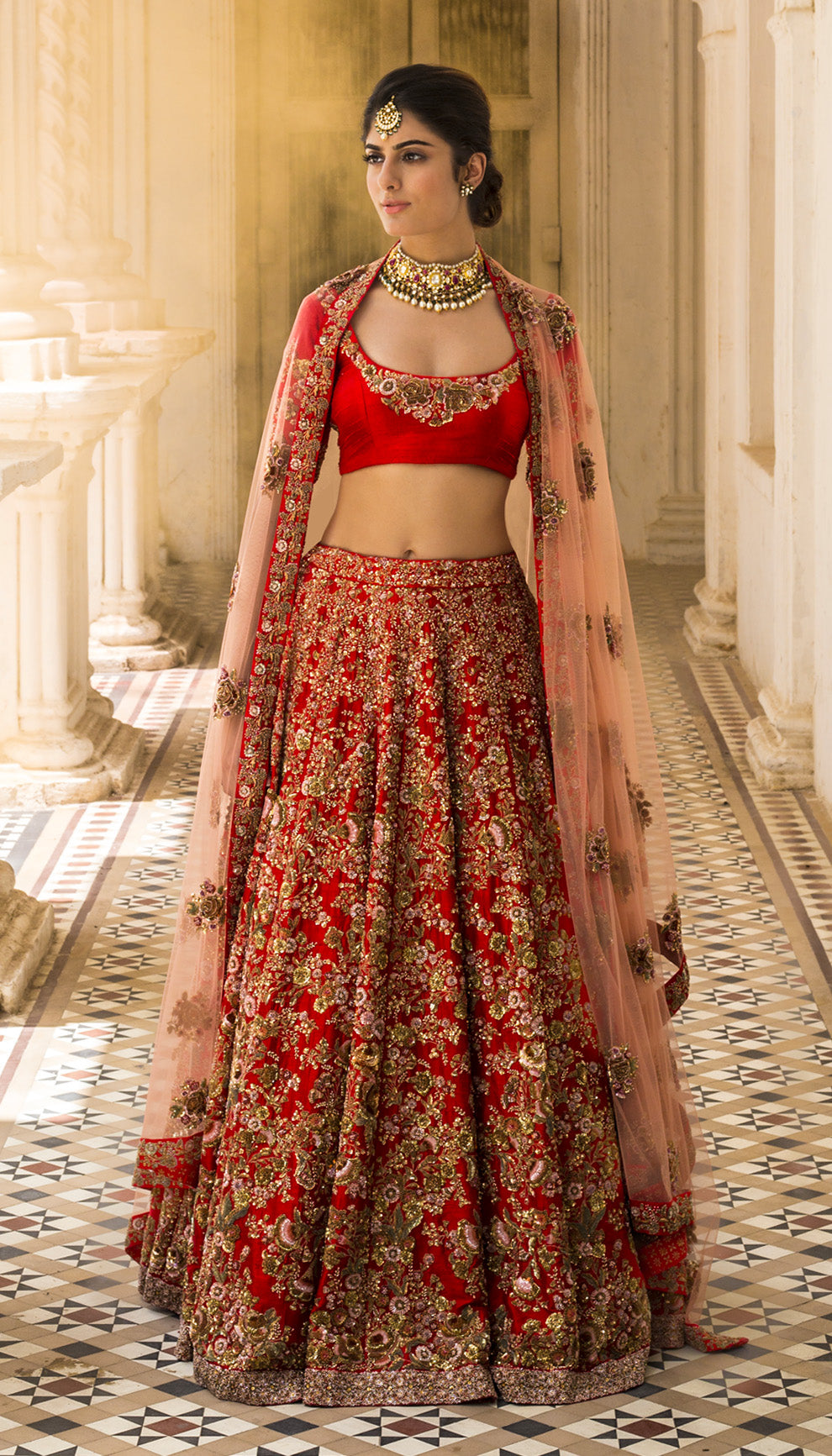 Woman in The Flaming Scarlet Primrose Lehenga by Shyamal & Bhumika.