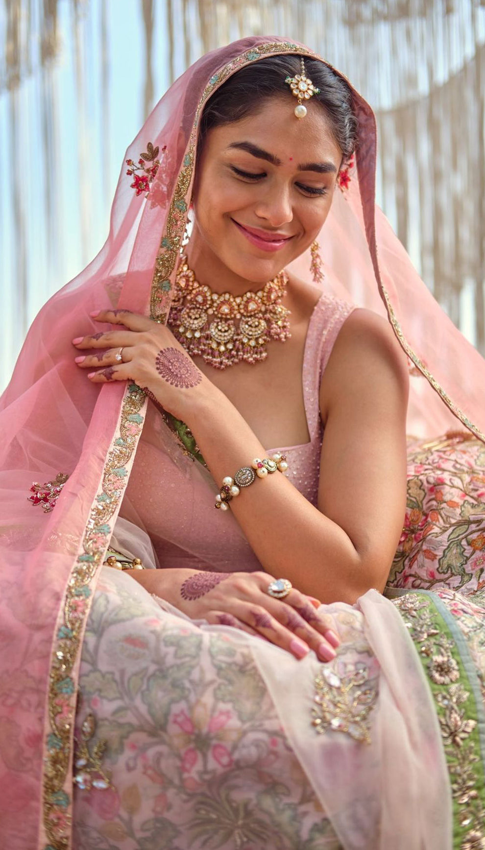 Mrunal Thakur in the Shell Pink Raw Silk Lehenga by shyamal & bhumika