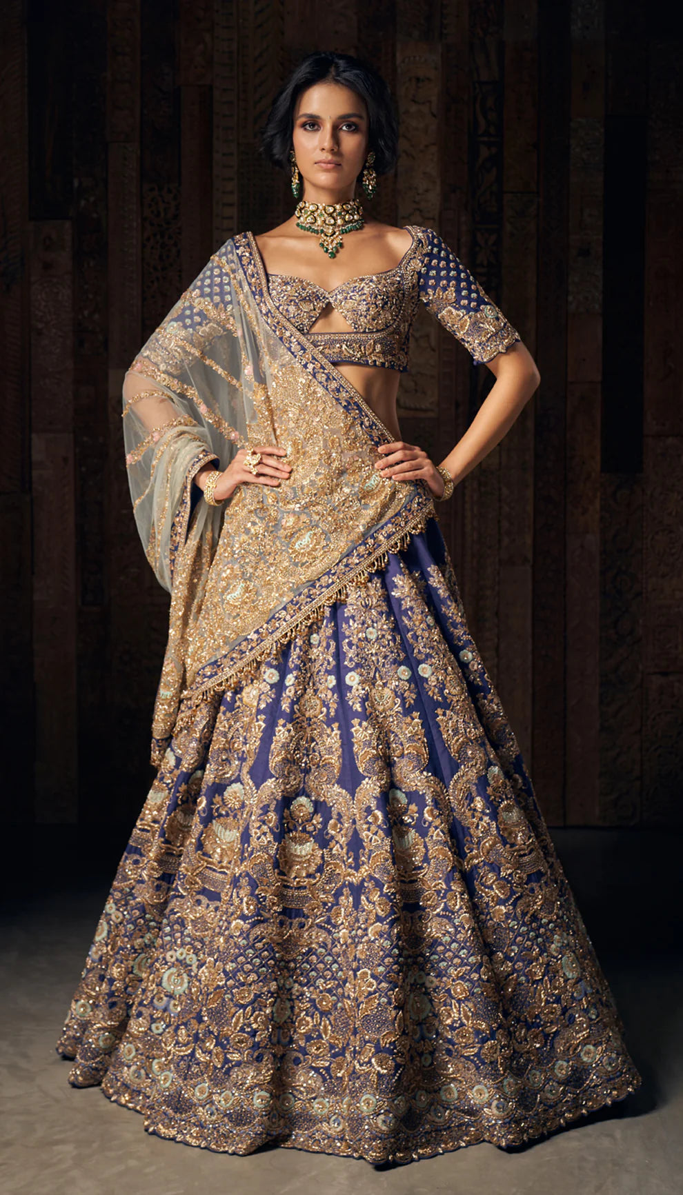 Woman in The Kamalmand Royal Blue Embroidered Bridal Lehenga by Shyamal & Bhumika.