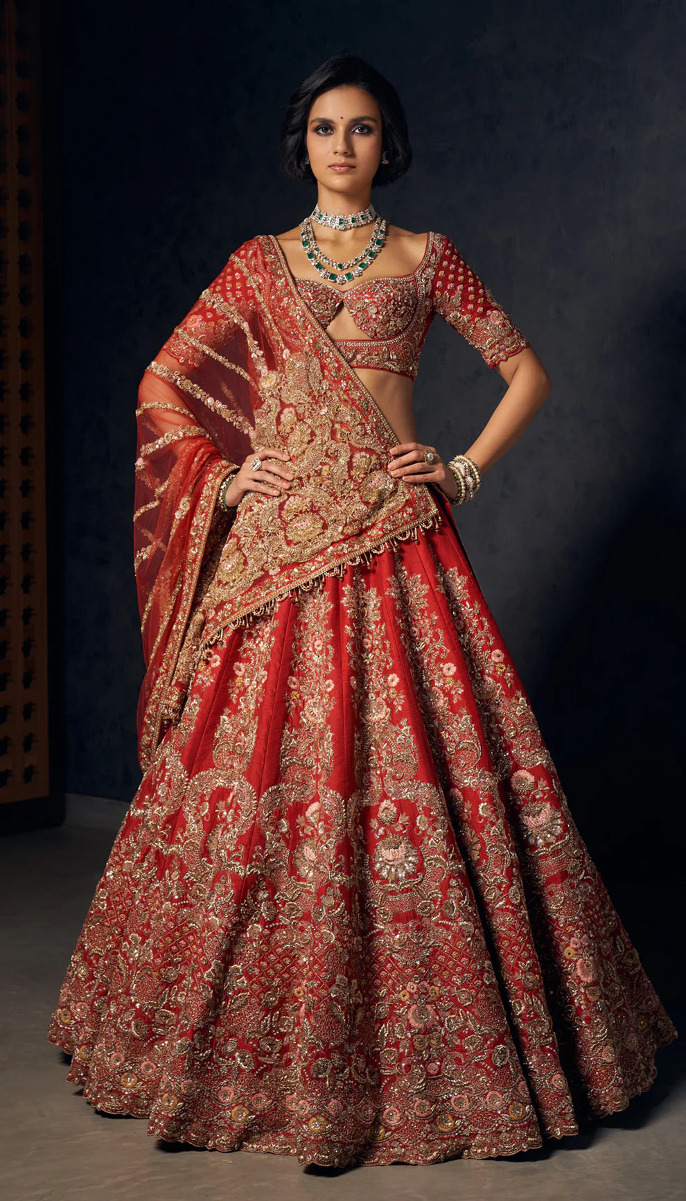 Raw silk, deep red bridal lehenga, Gujarati havelis, zardozi, peeta embroidery, tulle net dupatta, plunge- neck choli, tulle net drape, wedding pheras, reception evenings, festive celebrations, bridal lehenga, red lehenga, embroidered lehenga, zardozi lehenga, peeta lehenga