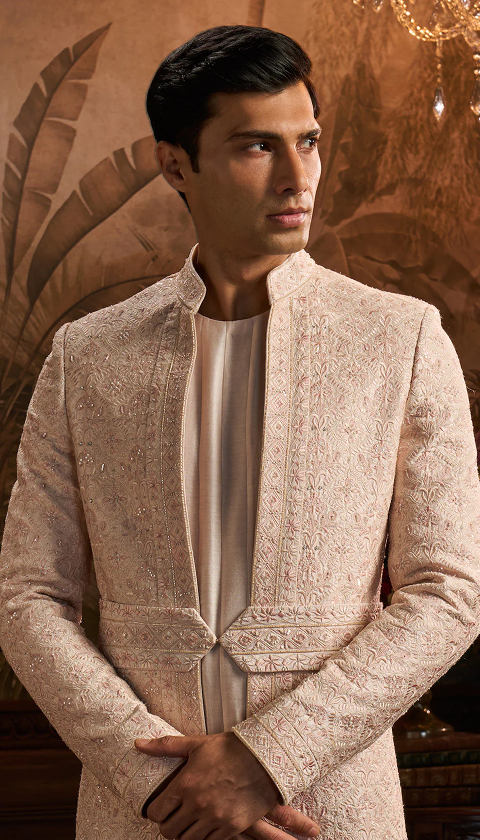 Powder pink raw silk sherwani, fine resham embroidery, crystals, glass pipes, sequins, tassar silk kalidar kurta, churidar, complementing shawl, grand weddings, festive gatherings, evening celebrations