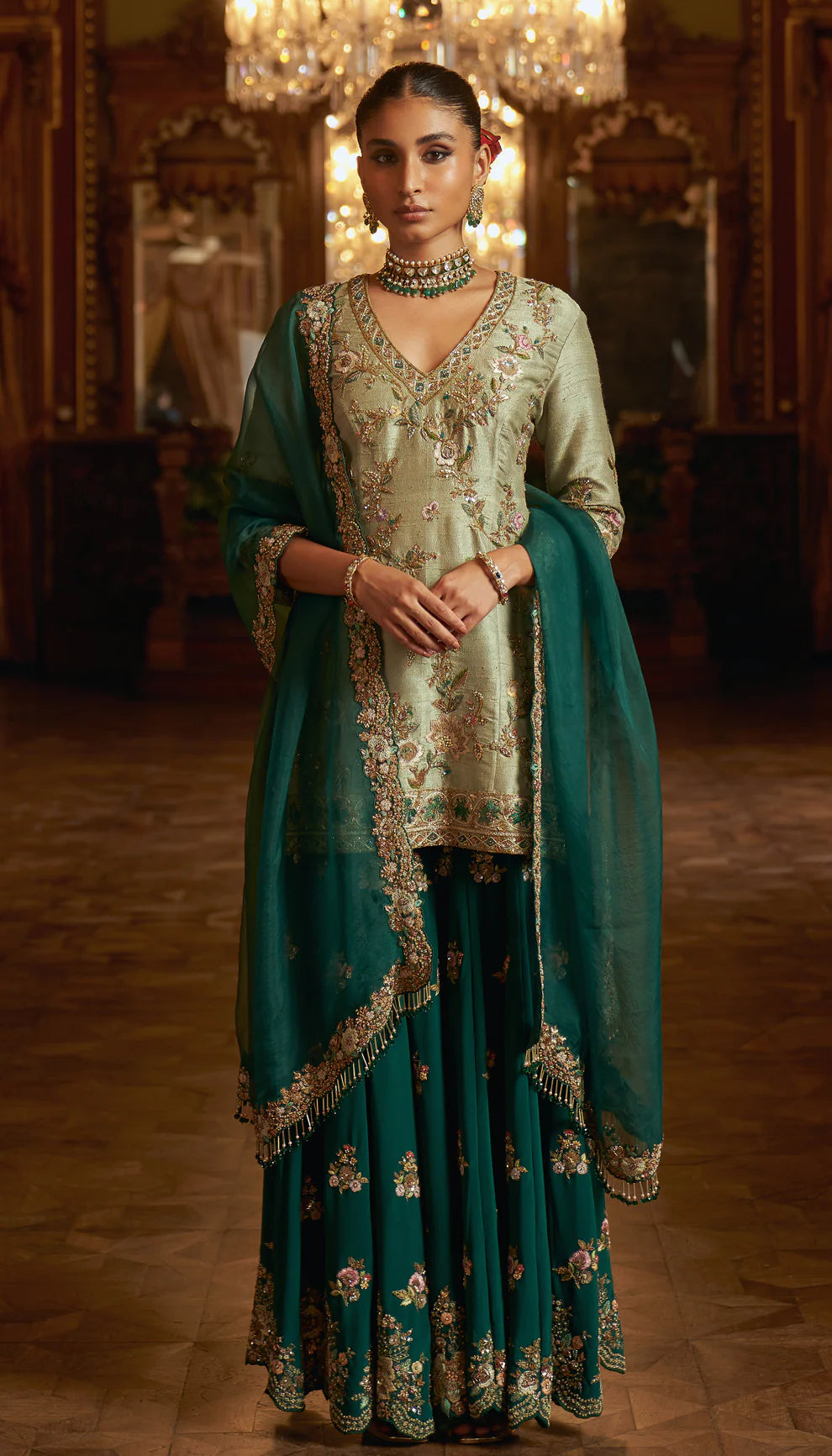 Fennel green, emerald sharara, embroidered, peeta, sequin, sheer organza dupatta, cutwork border, floral motifs, sharara, wedding celebrations, festive occasions, evening events, green sharara, embroidered green sharara, designer sharara