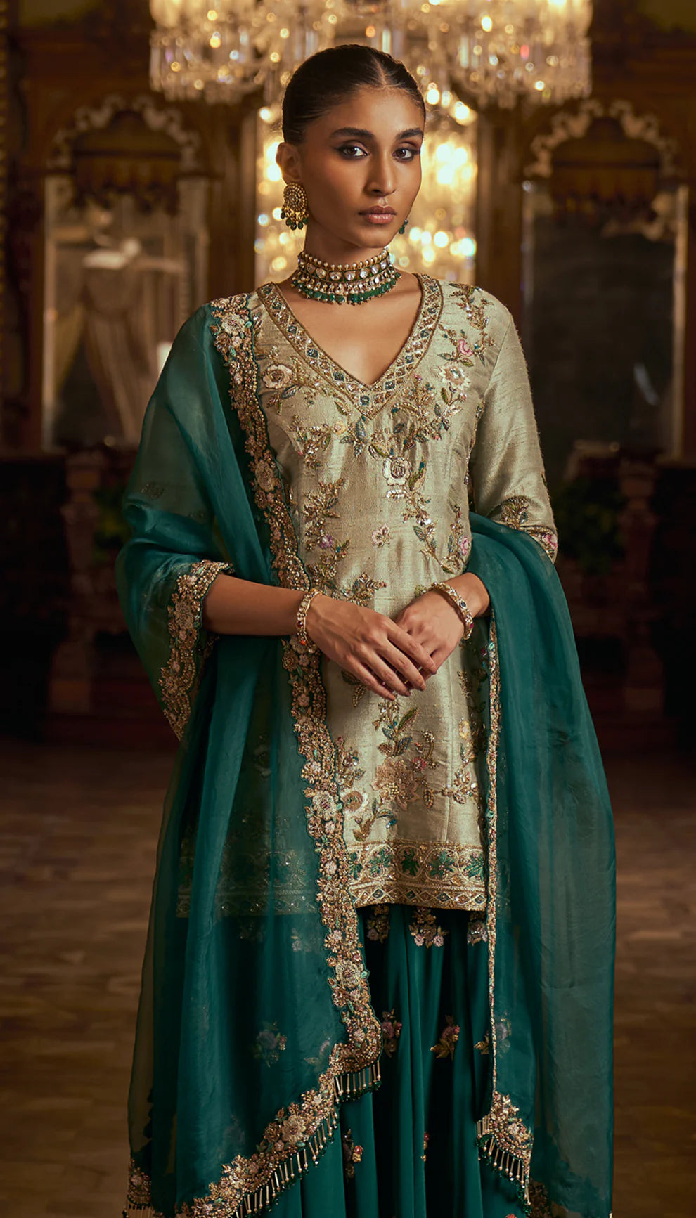 Fennel green, emerald sharara, embroidered, peeta, sequin, sheer organza dupatta, cutwork border, floral motifs, sharara, wedding celebrations, festive occasions, evening events, green sharara, embroidered green sharara, designer sharara