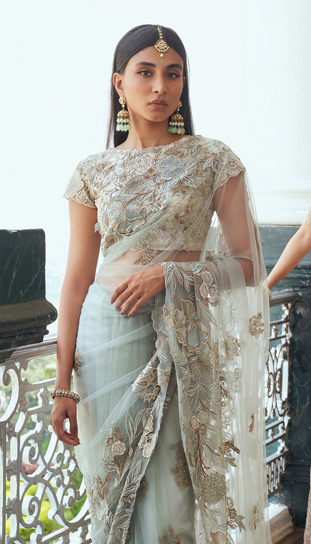 Frost blue, tulle net saree, floral motifs, embroidered, resham, sequins, embellished, warm ivory, tulle net blouse, light blue saree, weddings, festive occasions, evening parties, blue saree, designer blue saree, designer net saree, designer blue net saree, destination wedding, sangeet, haldi, mehndi, reception, festive wear, occasion wear