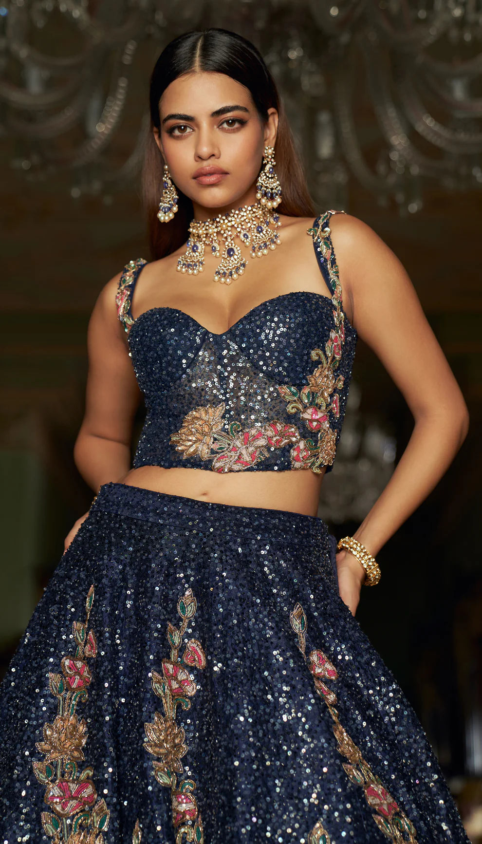 Midnight blue, raw silk lehenga, floral, embroidered, sequin base, glass beads, sequins, gold zardozi, tulle net, corset blouse, sheer organza dupatta, blue lehenga, weddings, festive celebrations, evening receptions