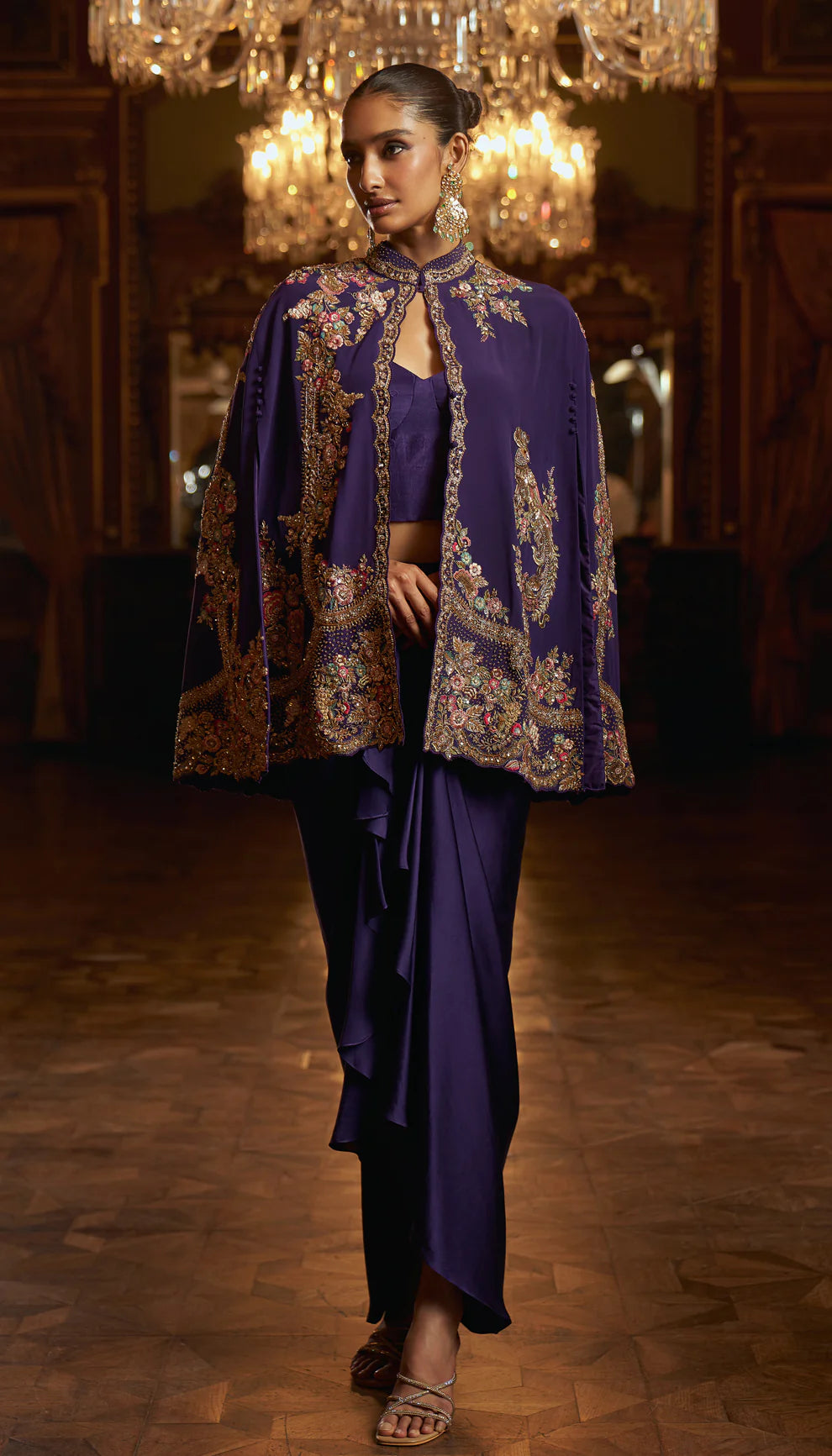 Indigo purple, crepe de chine cape, gold zardozi, resham embroidery, hand- crafted, fluid silk satin, draped skirt, indowestern, wedding, soirees, festive celebrations, evening gatherings