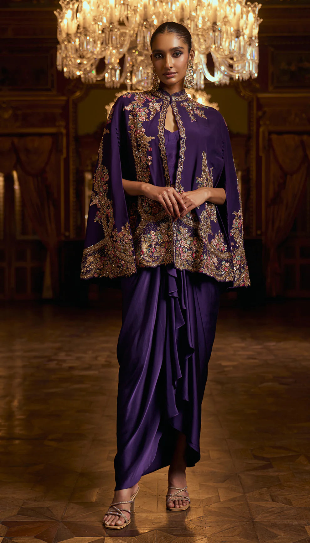 Indigo purple, crepe de chine cape, gold zardozi, resham embroidery, hand- crafted, fluid silk satin, draped skirt, indowestern, wedding, soirees, festive celebrations, evening gatherings