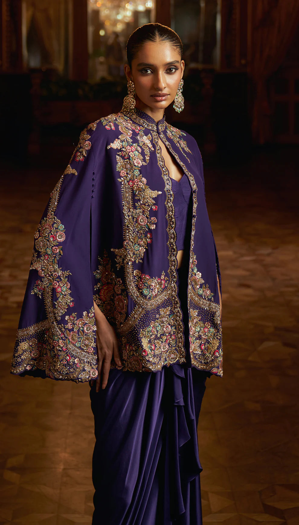 Indigo purple, crepe de chine cape, gold zardozi, resham embroidery, hand- crafted, fluid silk satin, draped skirt, indowestern, wedding, soirees, festive celebrations, evening gatherings
