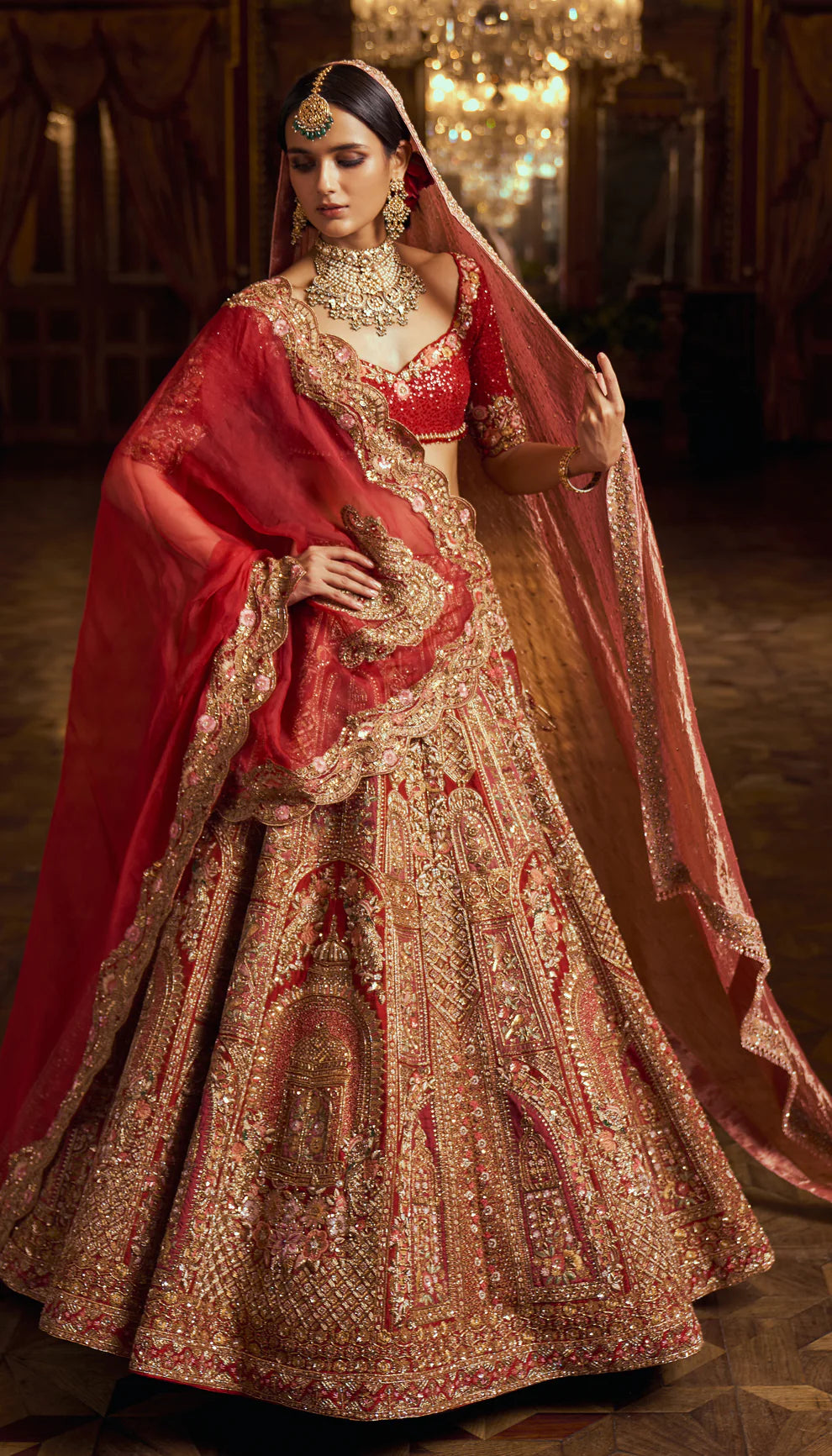 Crimson red, raw silk bridal lehenga, zardozi, aari embroidery, architectural motifs, inlay work, resham embroidery, gold beads, french knots, glass crystals, organza dupatta, raw silk choli, weddings, receptions