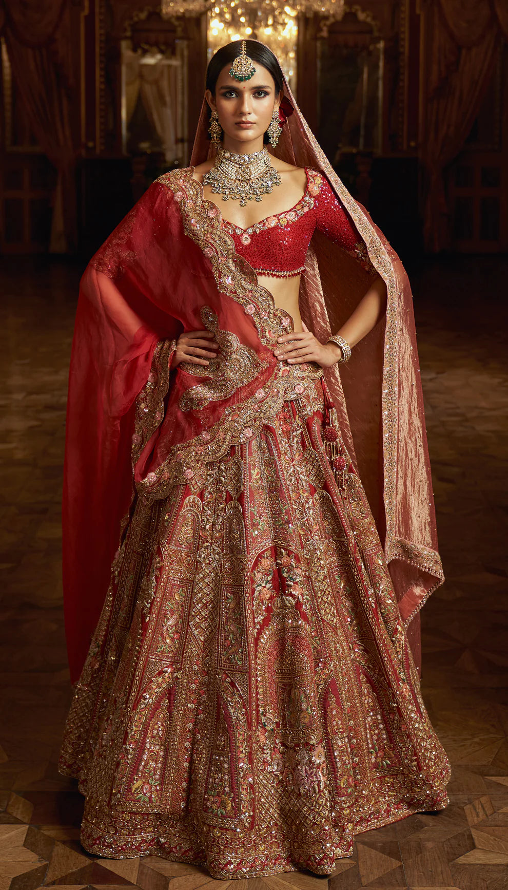 Crimson red, raw silk bridal lehenga, zardozi, aari embroidery, architectural motifs, inlay work, resham embroidery, gold beads, french knots, glass crystals, organza dupatta, raw silk choli, weddings, receptions