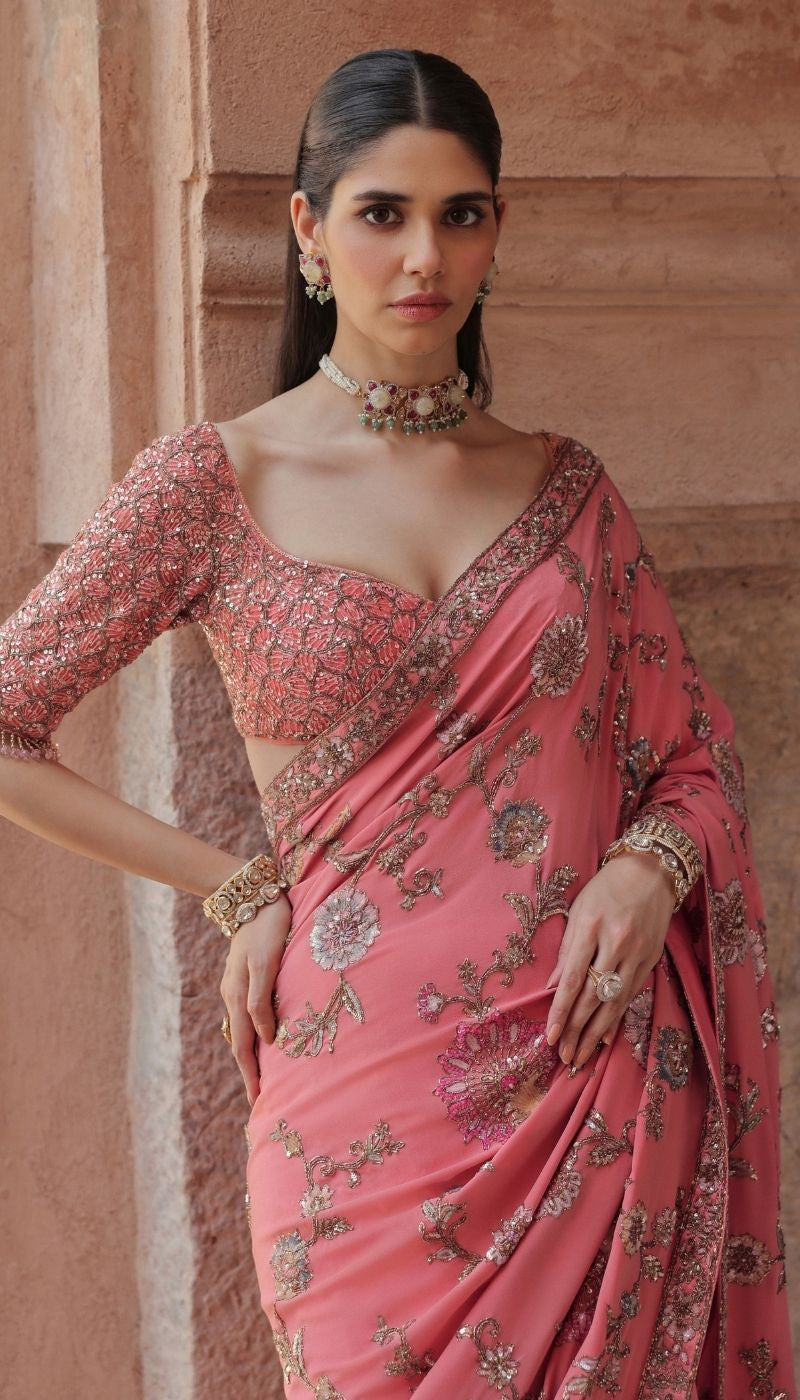 A Sunset Peach Crepe Silk Saree