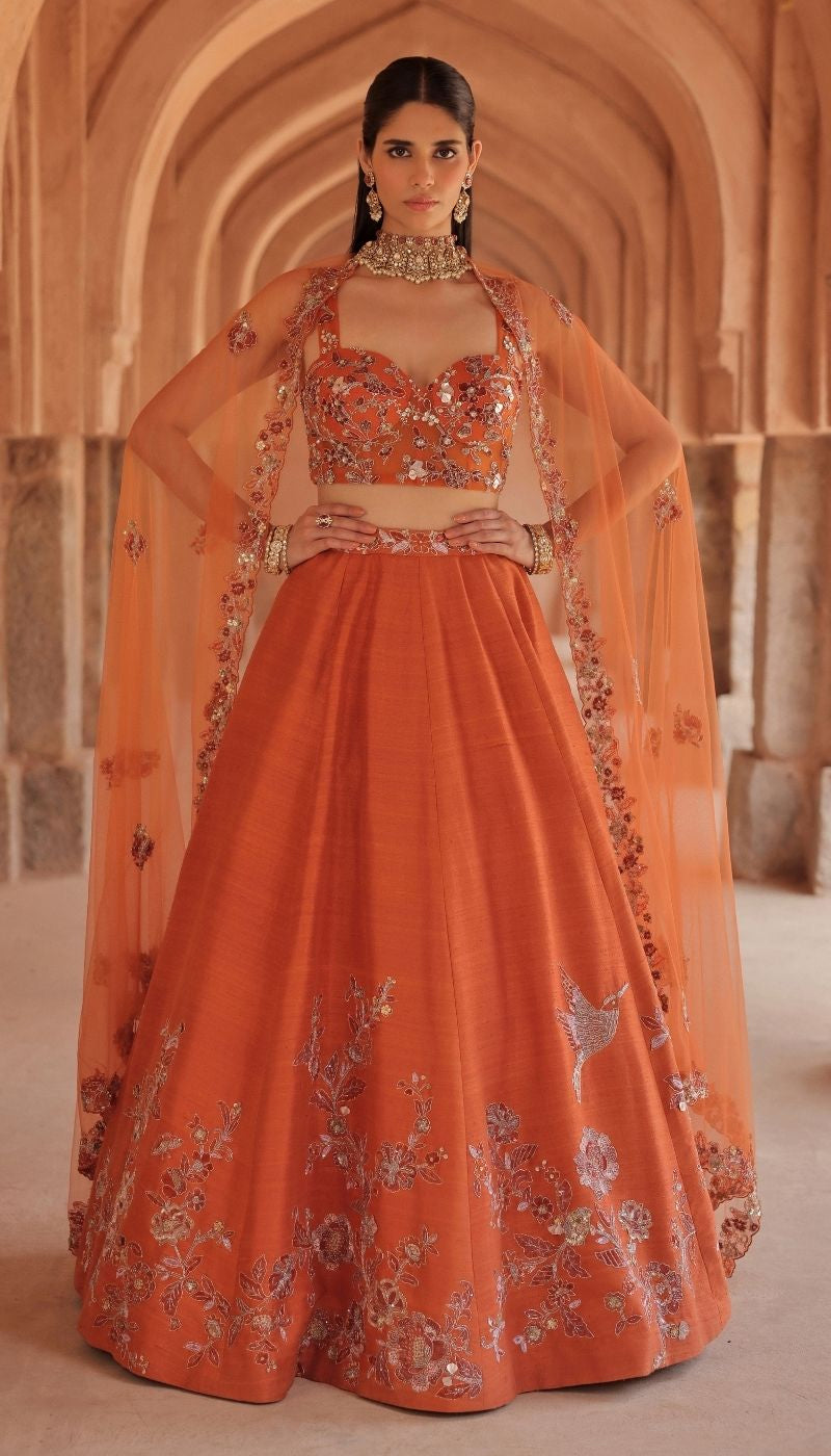 A Warm Burnt Orange Raw silk Panelled Lehenga Set