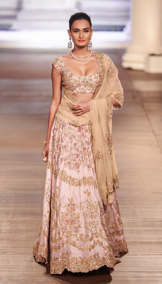 A Vintage Pink Raw Silk Lehenga with Gilded Gold and Sequins Embroidery