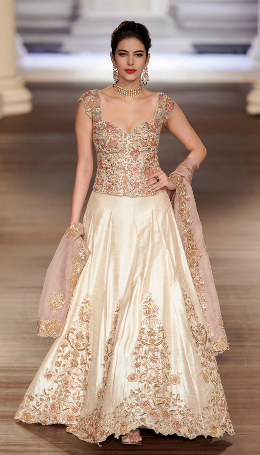 Ivory Raw Silk Lehenga with Antique Gold Embroidery