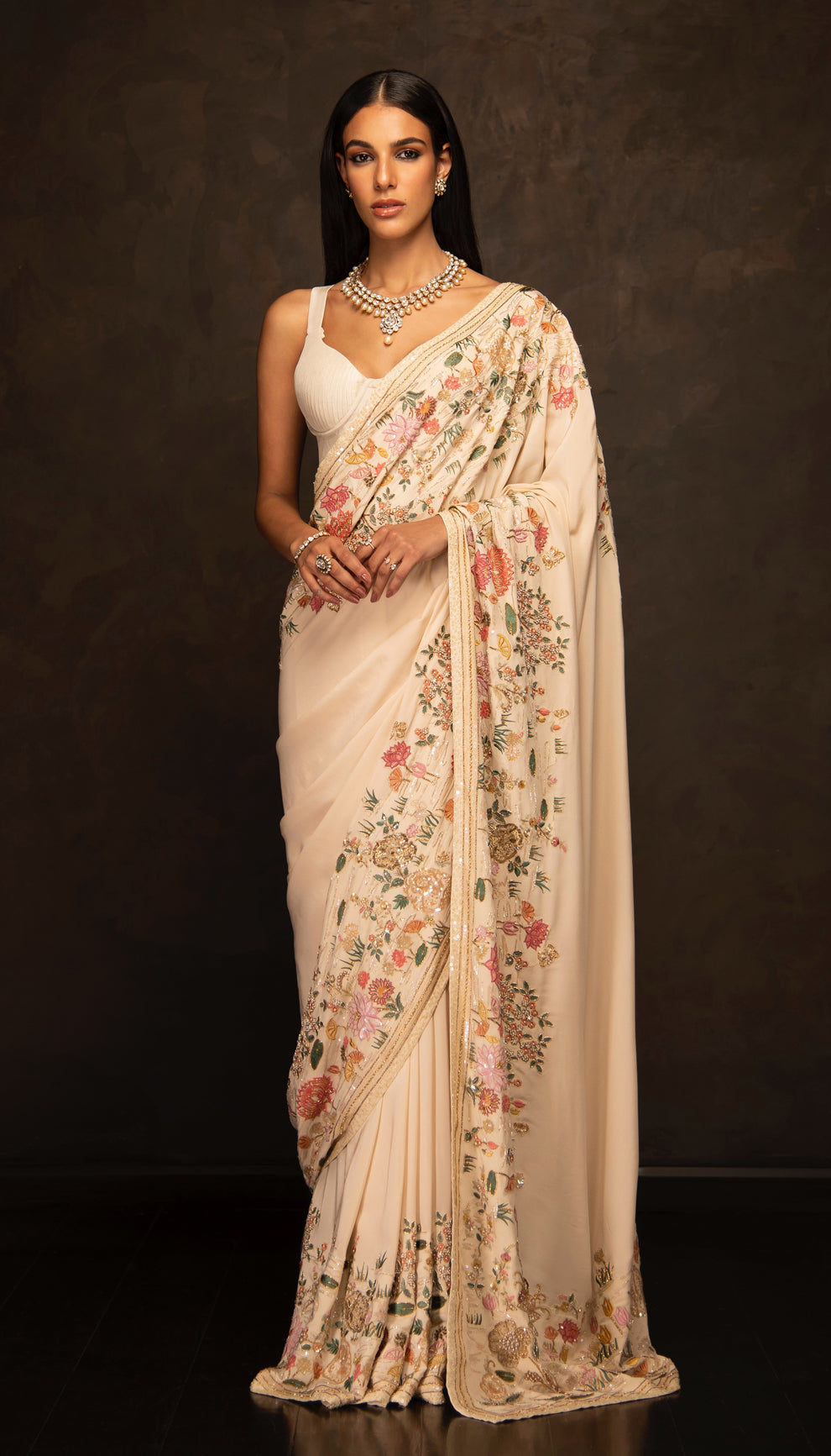 The Ivory Embroidered Crepe Silk Saree