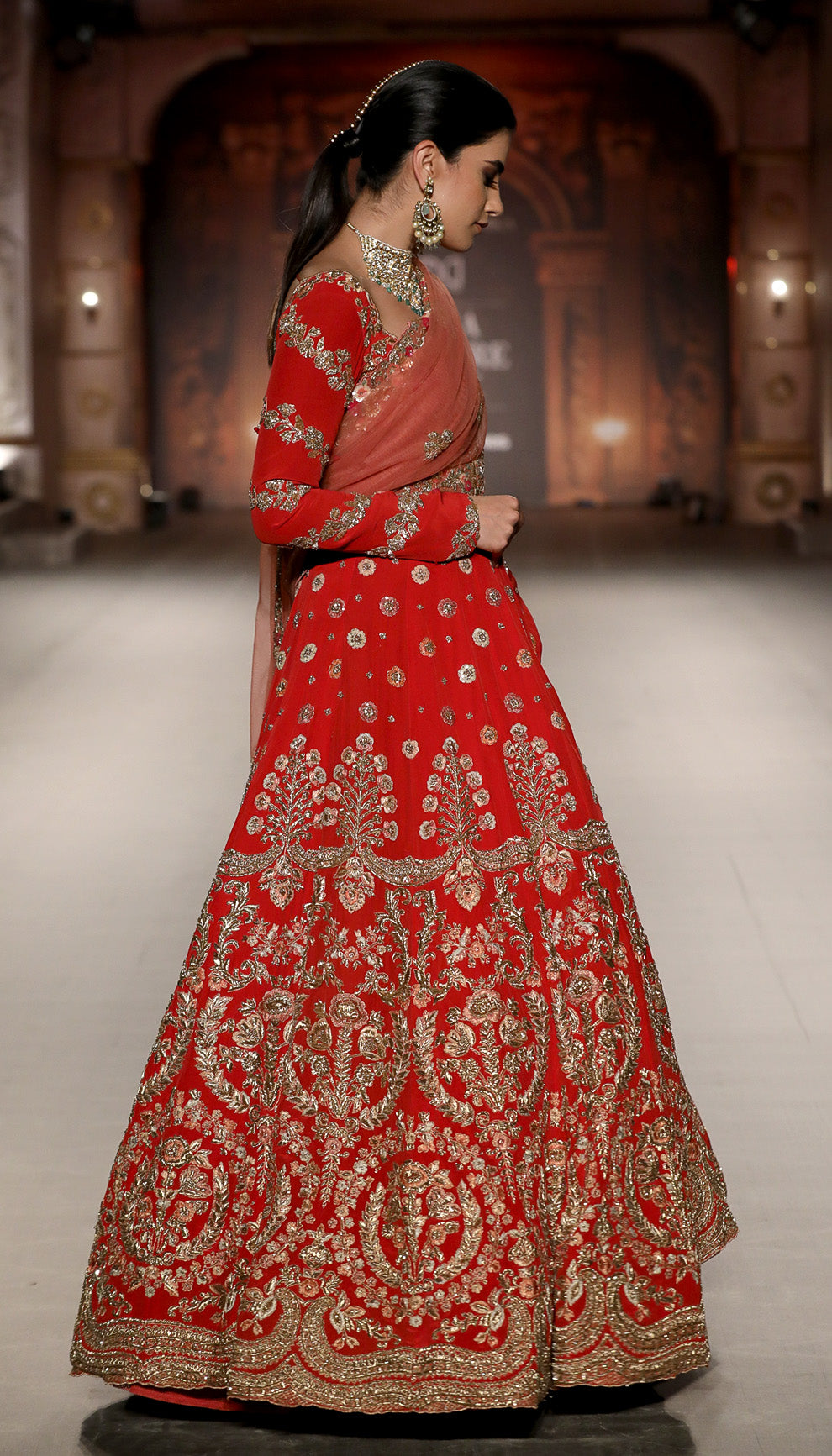 A Fiery Red Crepe Silk Bridal Kalidaar Gown