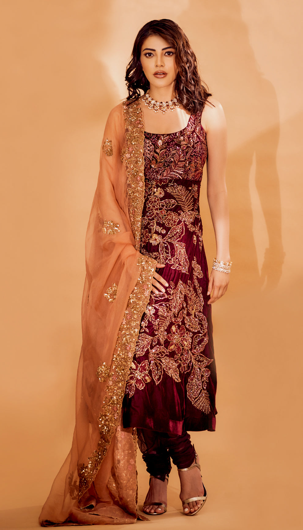 Kajal aggrawal in a wine velvet kurta set by shyamal & bhumika