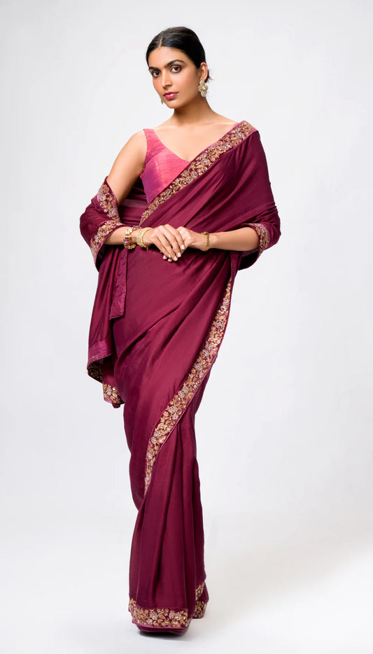 A Satin Silk Saree with Intricate Zardosi Border