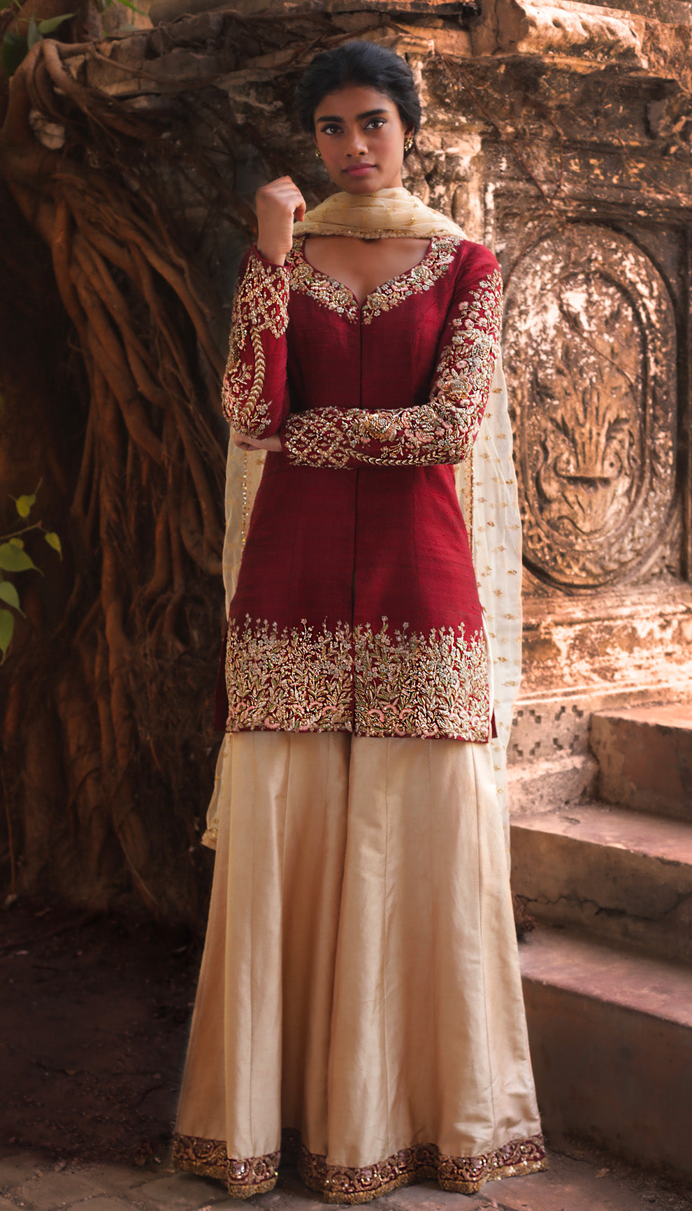 Woman wearing The Maroon Embroidered Raw Silk Sharara by Shyamal & Bhumika.