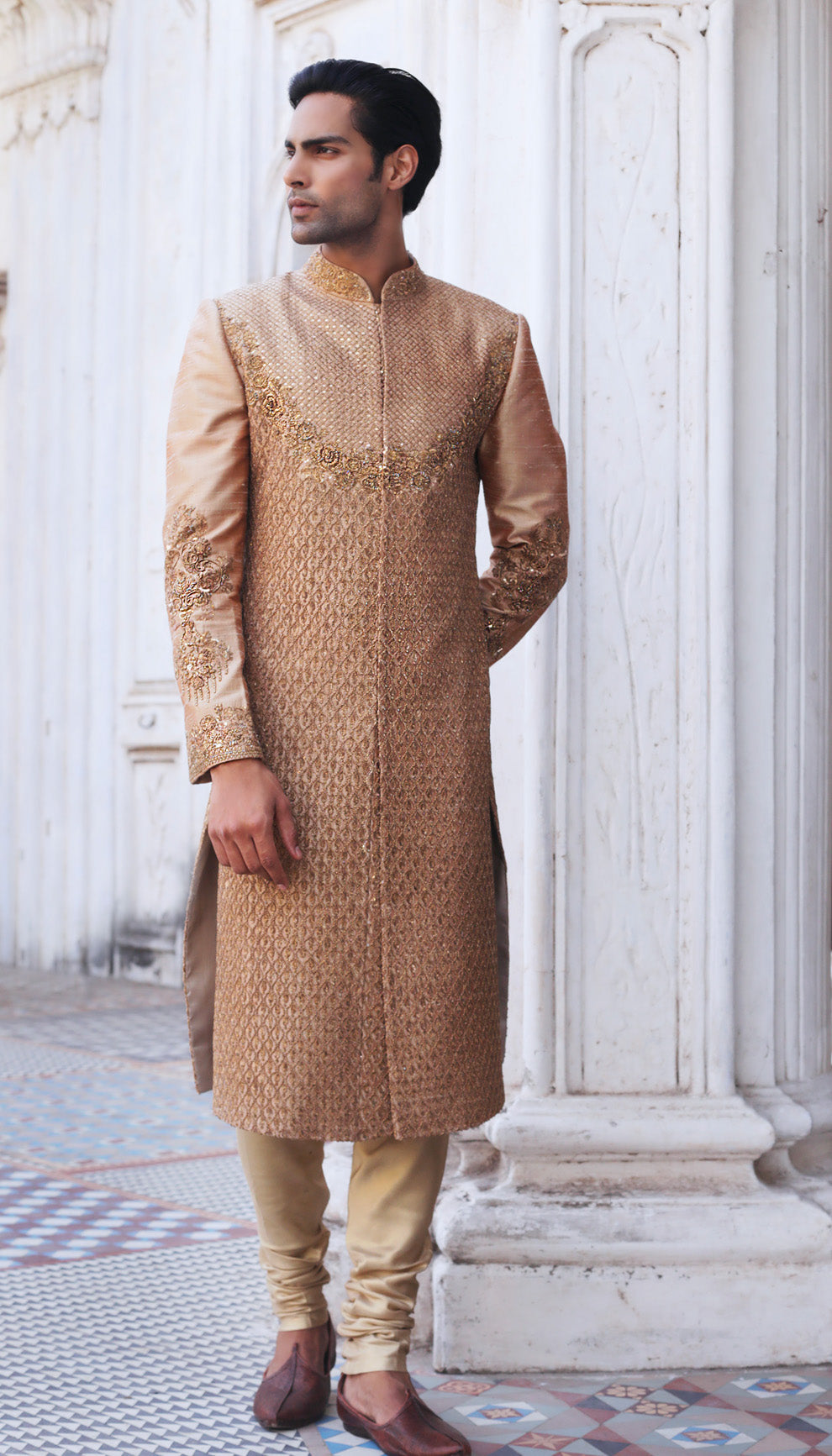 Man wearing The Almond Beige Raw Silk Sherwani by Shyamal & Bhumika.