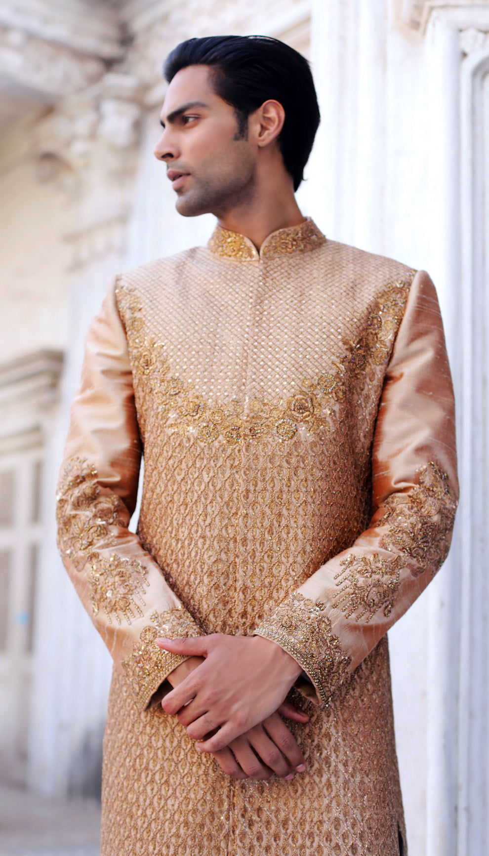 Man wearing The Almond Beige Raw Silk Sherwani by Shyamal & Bhumika.