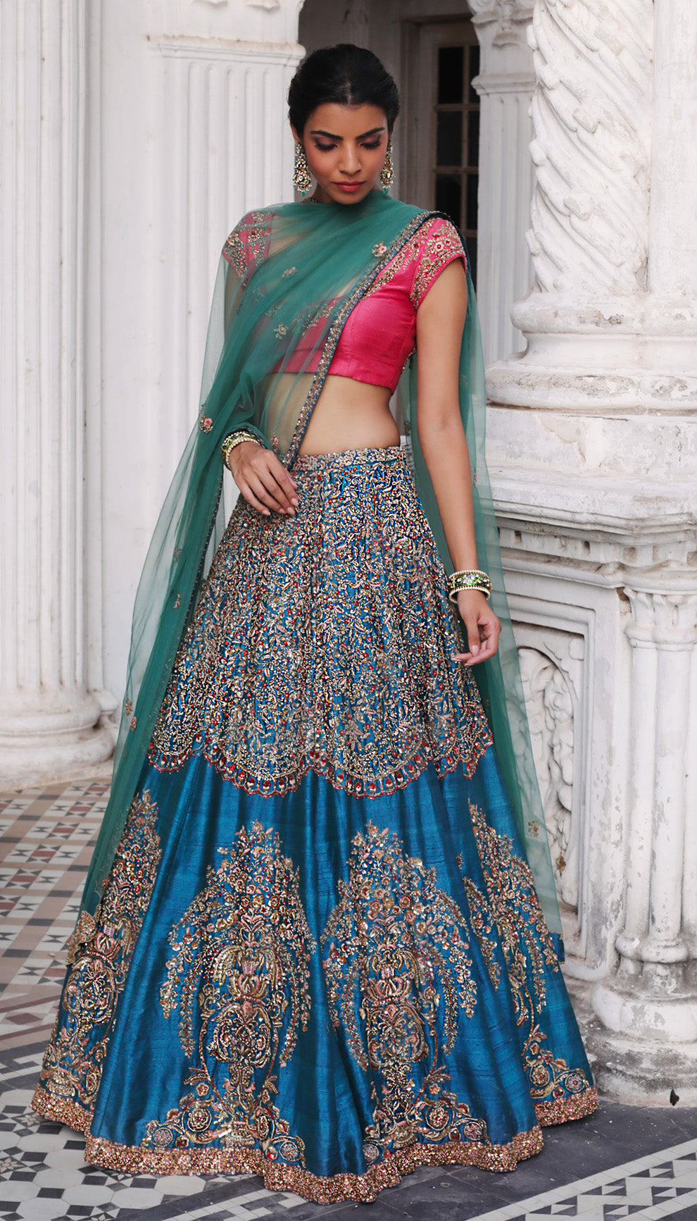 Woman in The Royal Blue Embroidered Lehenga by Shyamal & Bhumika.