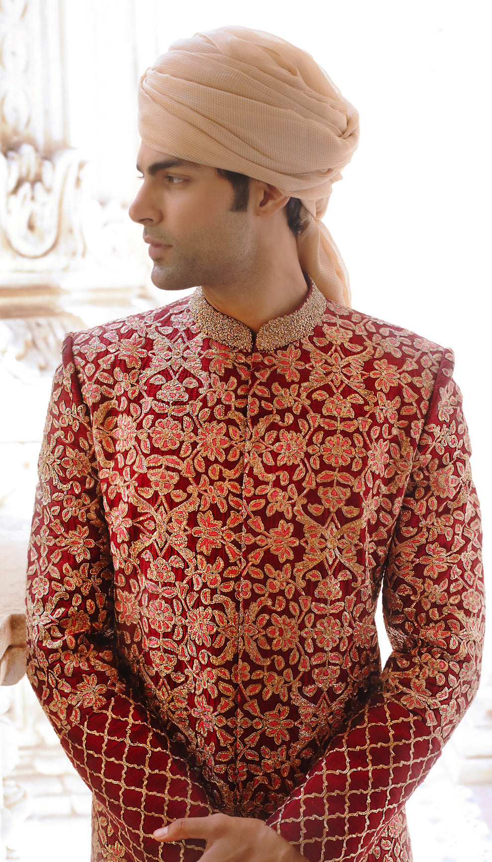 Man in The Rich Red Embroidered Sherwani by Shyamal & Bhumika.