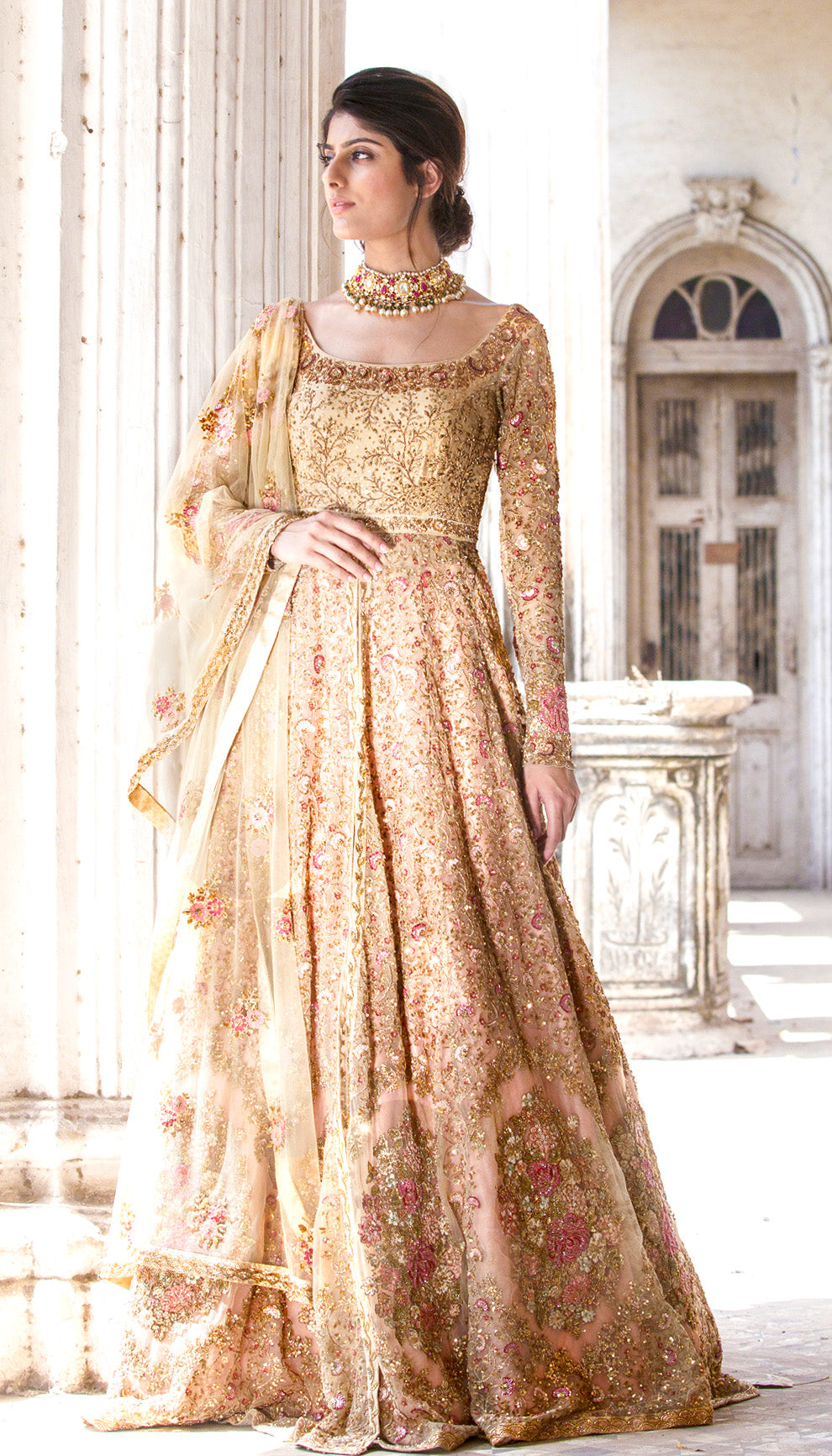 Woman in The Champagne Floral Crest Jacket Lehenga by Shyamal & Bhumika.