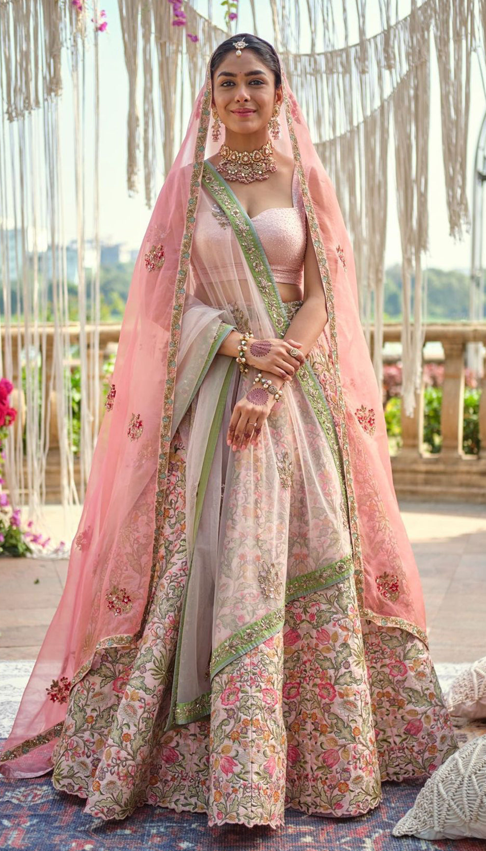 Mrunal Thakur in the Shell Pink Raw Silk Lehenga by shyamal & bhumika