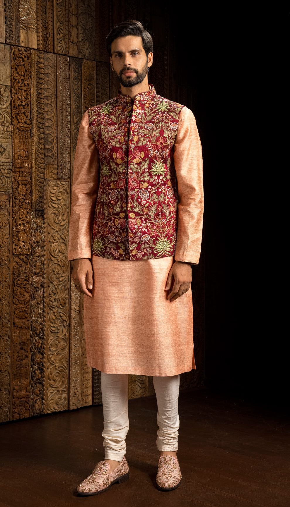 A Deep Red Raw Silk Jacket with Multicoloured Resham Embroidery