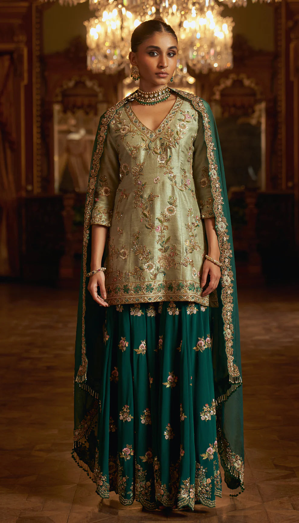 Fennel green, emerald sharara, embroidered, peeta, sequin, sheer organza dupatta, cutwork border, floral motifs, sharara, wedding celebrations, festive occasions, evening events, green sharara, embroidered green sharara, designer sharara