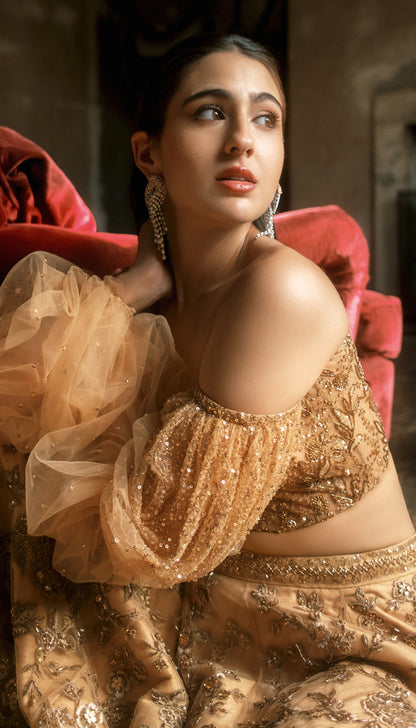 Sara Ali Khan in Champagne-Gold Tulle Trail Lehenga